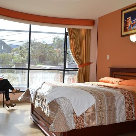 Club Ejecutivo Hotel Baños Habitación foto